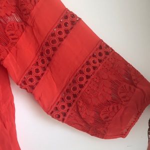 Red/orange long sleeve blouse, very light